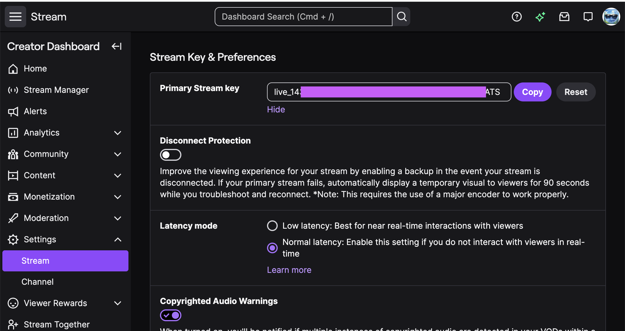 Twitch Creator Dashboard Stream settings showing the Primary Stream Key field with Copy and Reset buttons